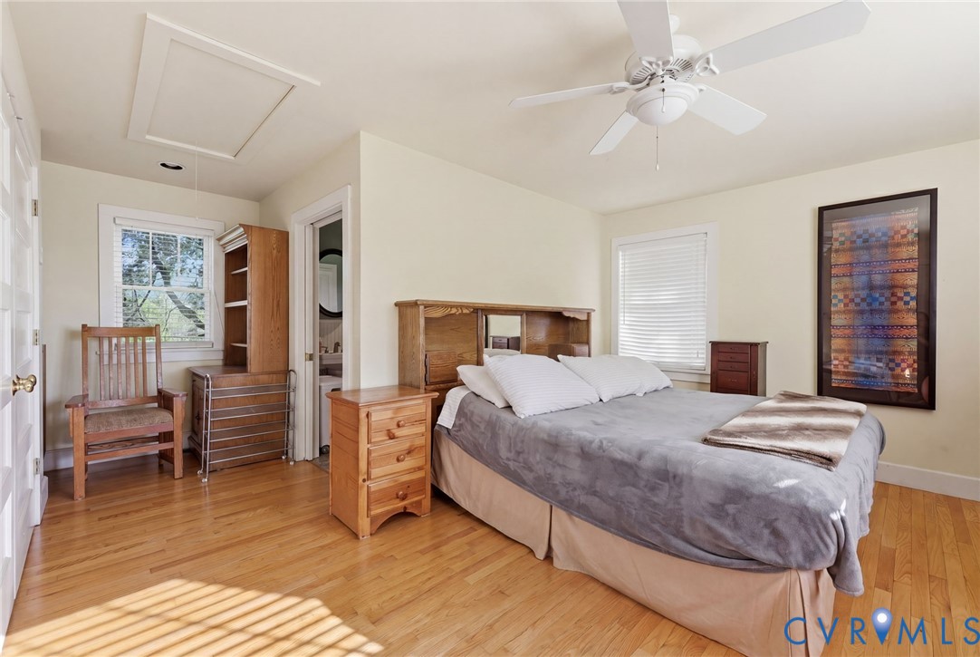 334 Pump Road New Canton, VA 23123 - Photo 13 of 74 a bedroom with a large bed and a couch