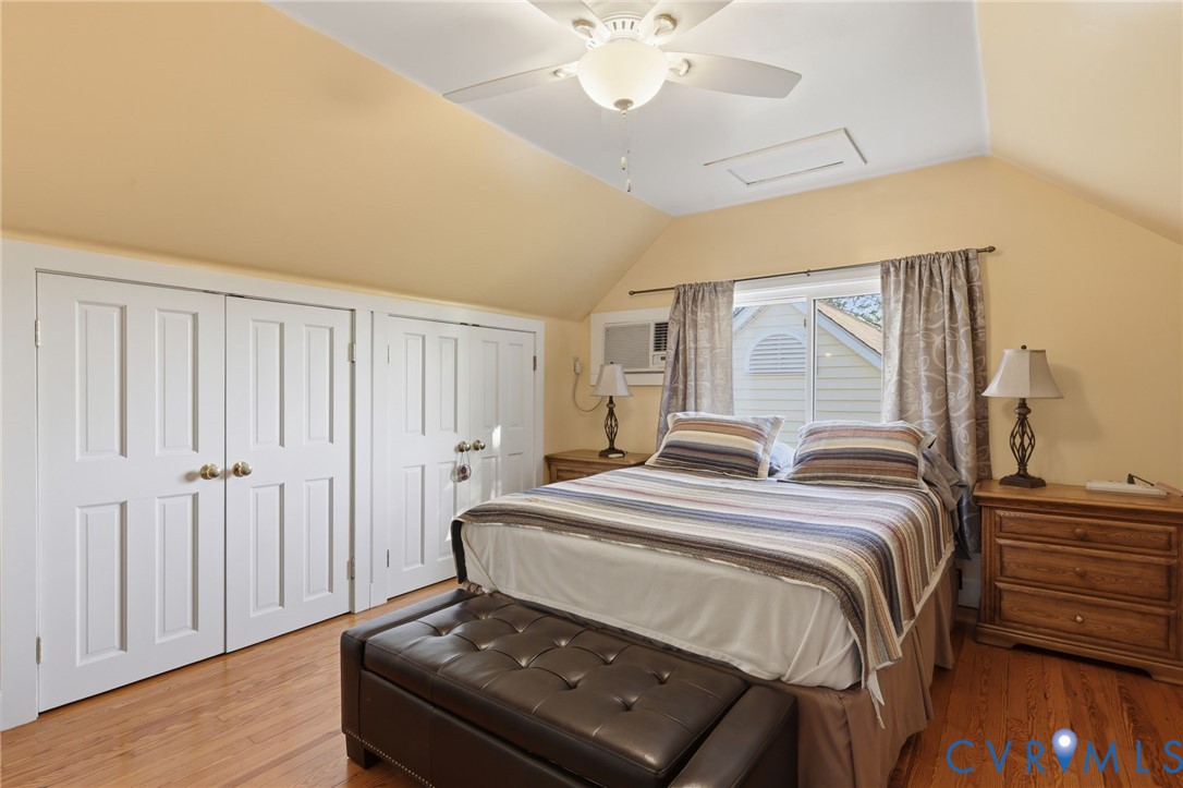 334 Pump Road New Canton, VA 23123 - Photo 20 of 74 a bedroom with a bed and a chandelier