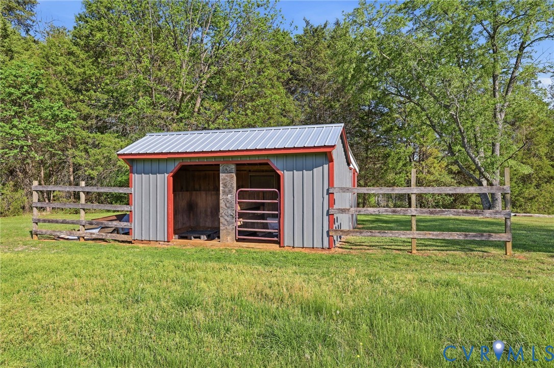 334 Pump Road New Canton, VA 23123 - Photo 35 of 74 a view of a house with a yard and sitting area