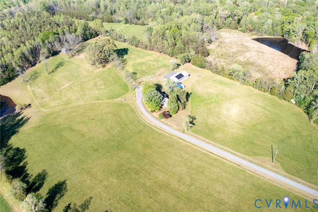 334 Pump Road New Canton, VA 23123 - Photo 39 of 74 a view of a swimming pool with a yard