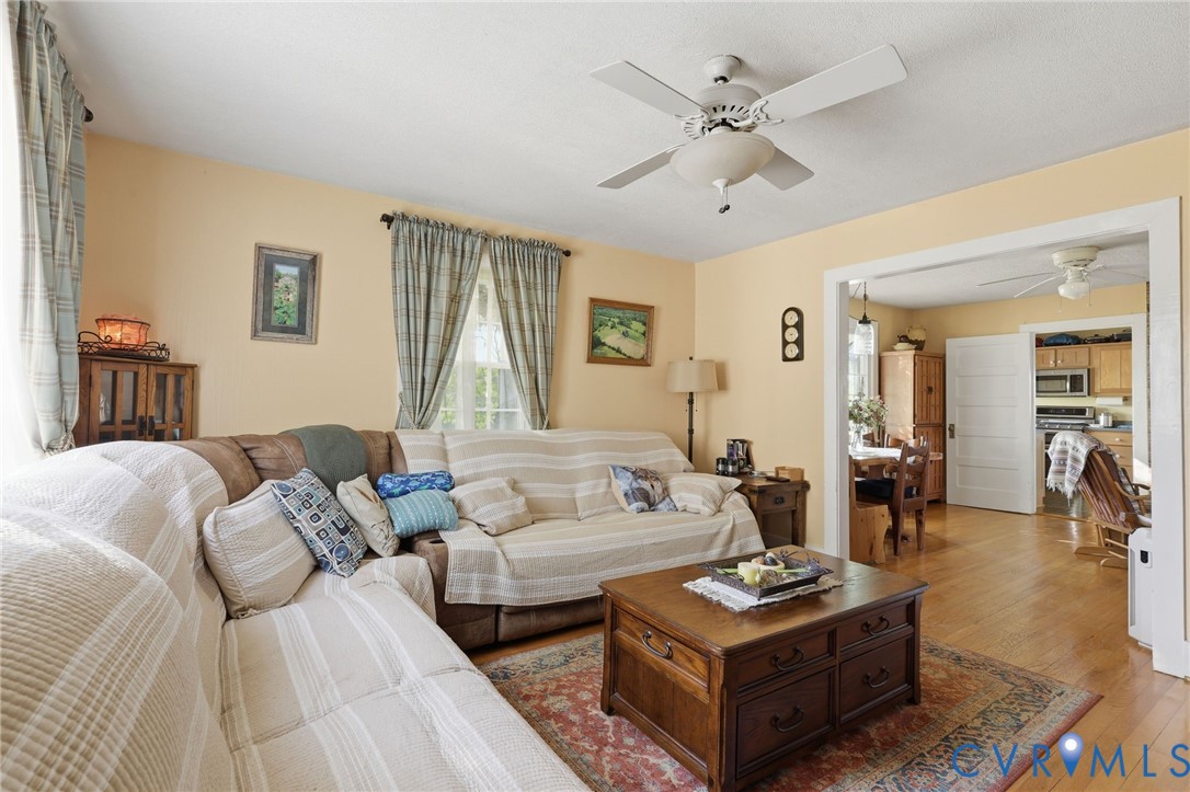 334 Pump Road New Canton, VA 23123 - Photo 5 of 74 a living room with furniture and a large window