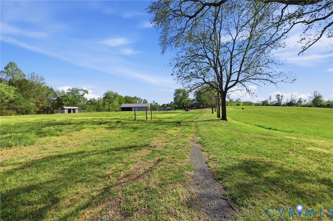 334 Pump Road New Canton, VA 23123 - Photo 54 of 74 a view of a grassy field with trees