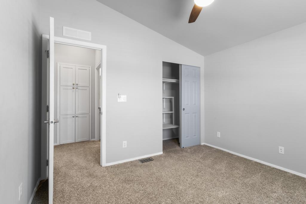 1545 East El Rodeo Road, Unit 42 Fort Mohave, AZ 86426 - Photo 30 of 45 an empty room with closet and windows
