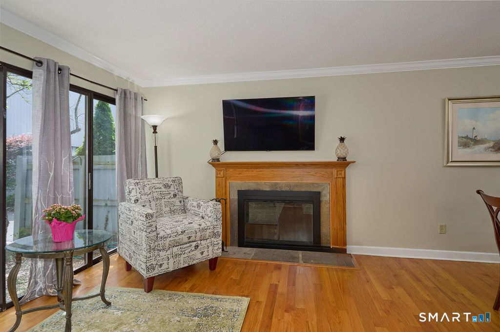 6 Hollyberry Lane, Unit 6 Ridgefield, CT 06877 - Photo 5 of 31 Living Room Slider to Courtyard
