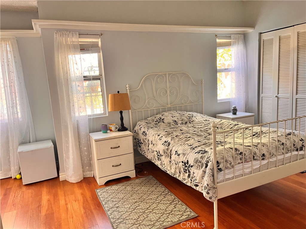 19849 Collins Road Canyon Country, CA 91351 - Photo 19 of 32 a bedroom with a bed and a window