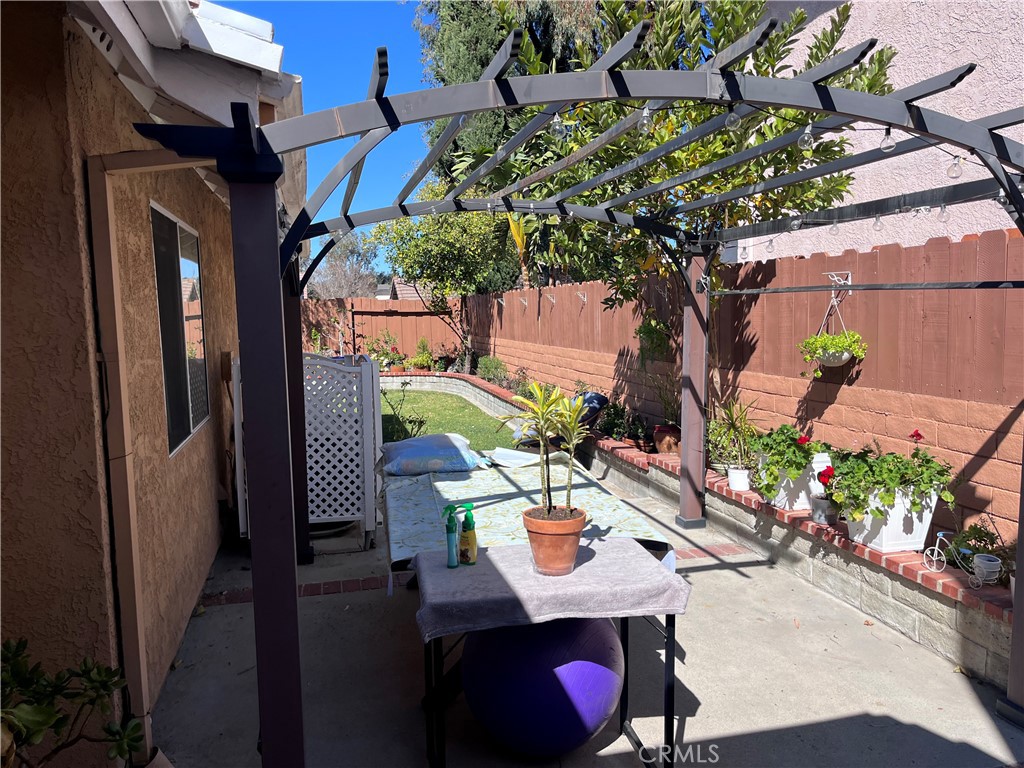 19849 Collins Road Canyon Country, CA 91351 - Photo 31 of 32 a view of a chairs and table in a patio