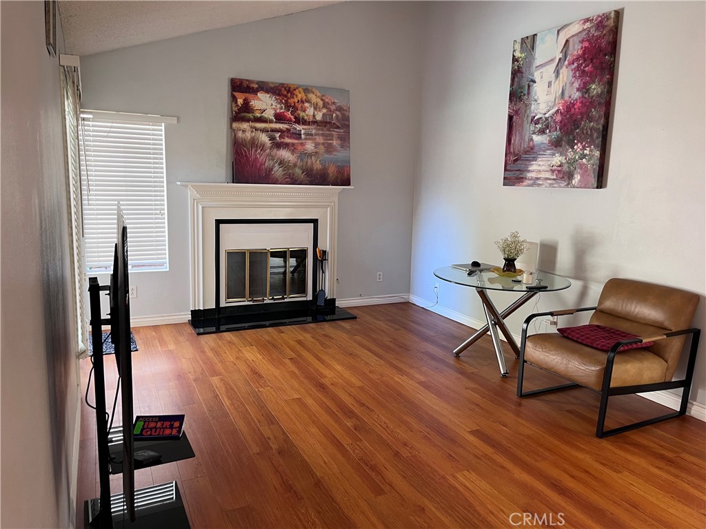 19849 Collins Road Canyon Country, CA 91351 - Photo 5 of 32 a living room with furniture and a fireplace