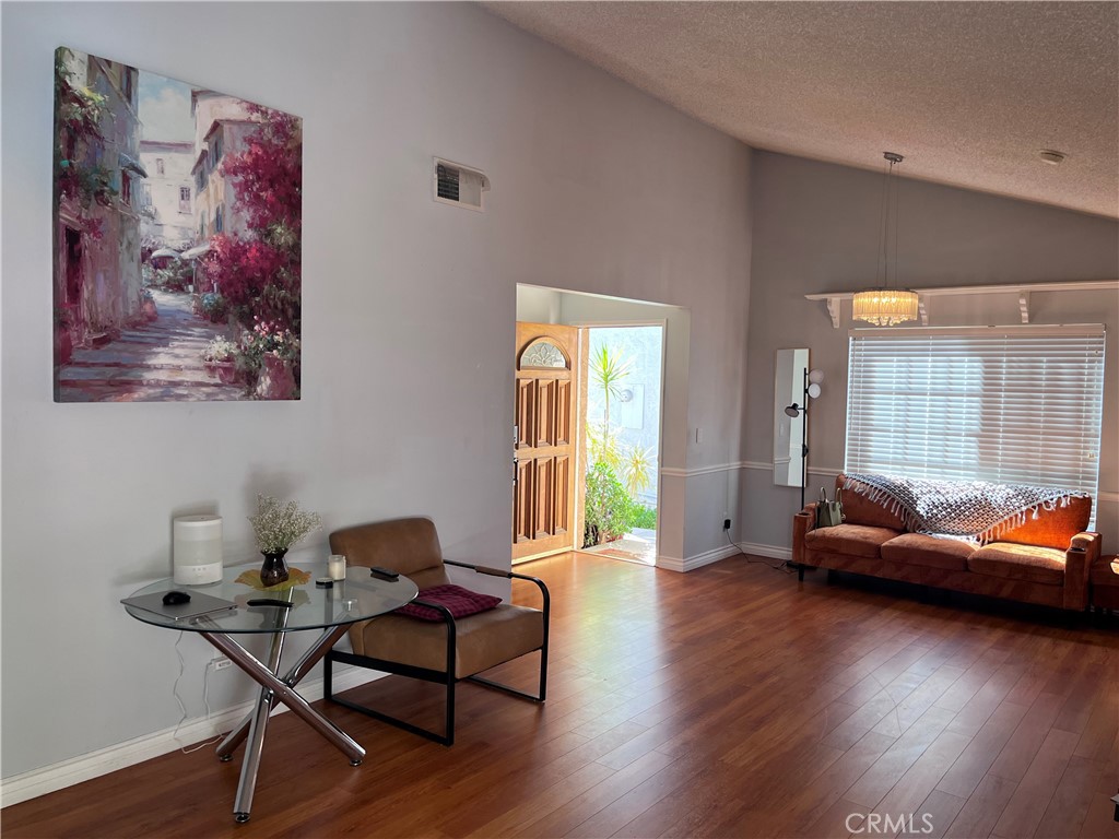 19849 Collins Road Canyon Country, CA 91351 - Photo 9 of 32 a living room with furniture and a wooden floor