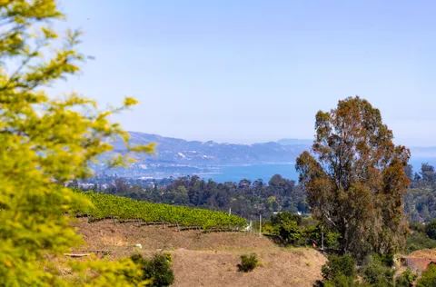 a view of a lake with mountains in the background