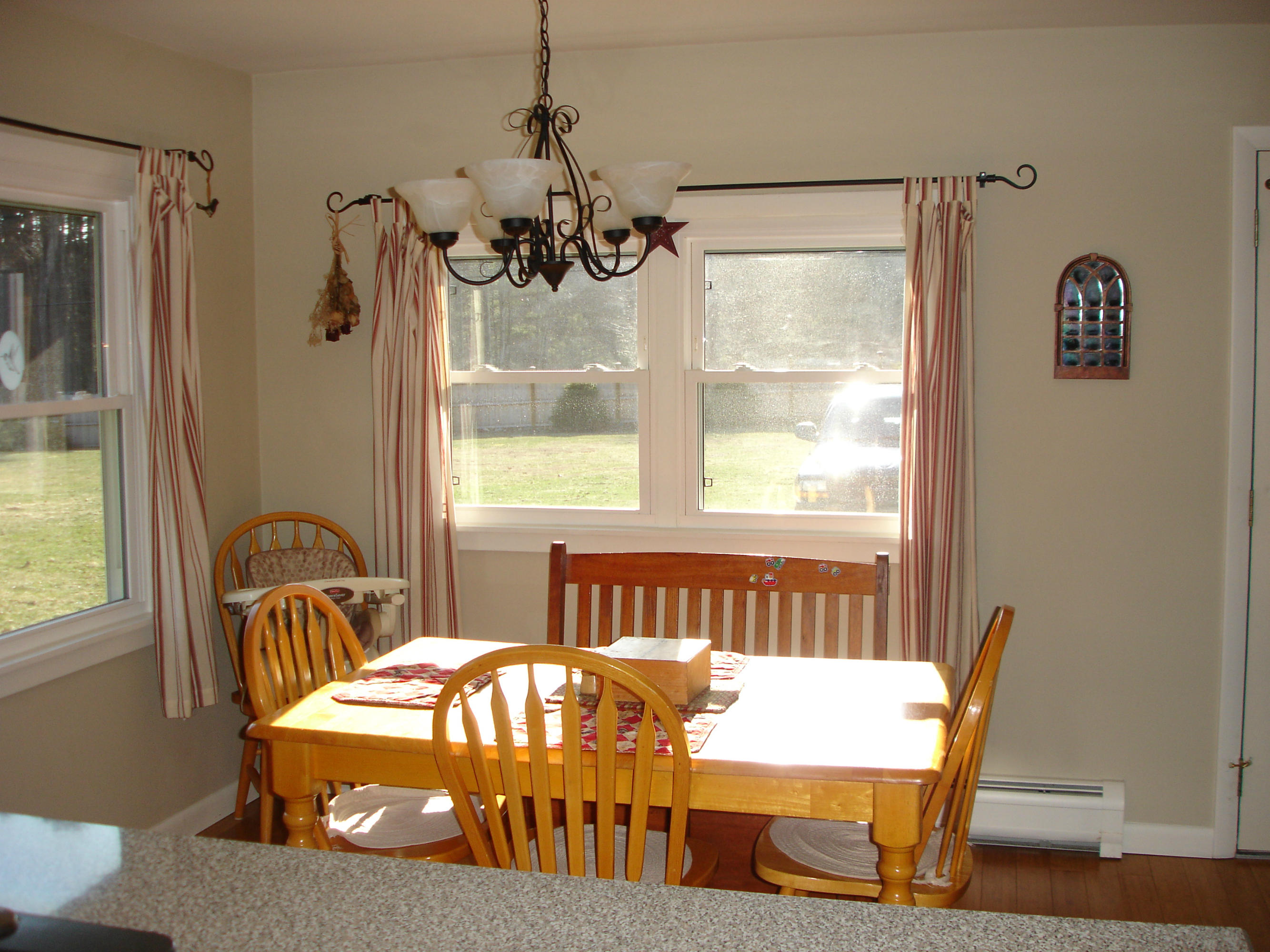 358 North Main Road Otis, MA 01253 - Photo 2 of 18 a bedroom with a bed and window