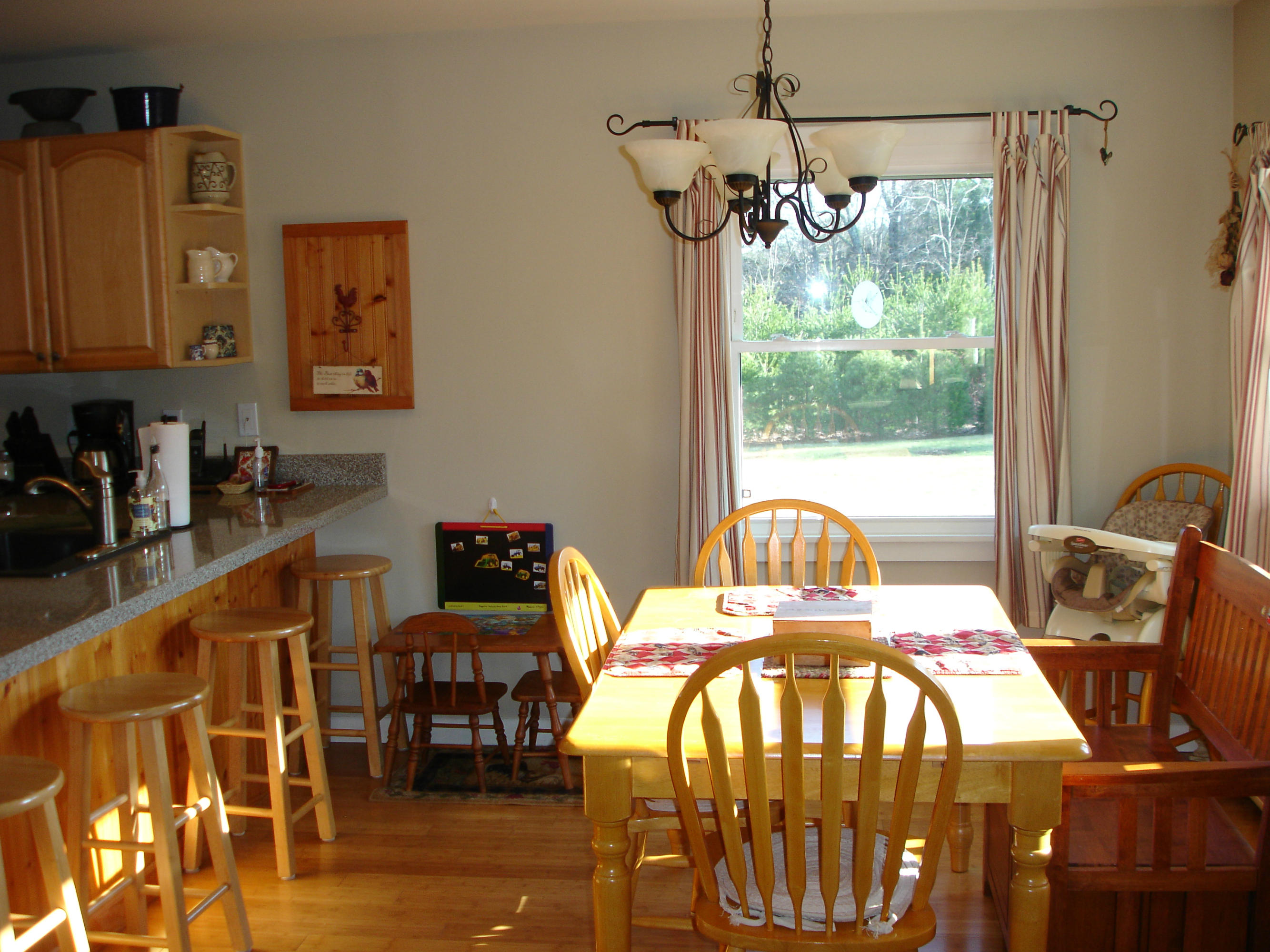 358 North Main Road Otis, MA 01253 - Photo 4 of 18 a view of a dining room with furniture window and outside view