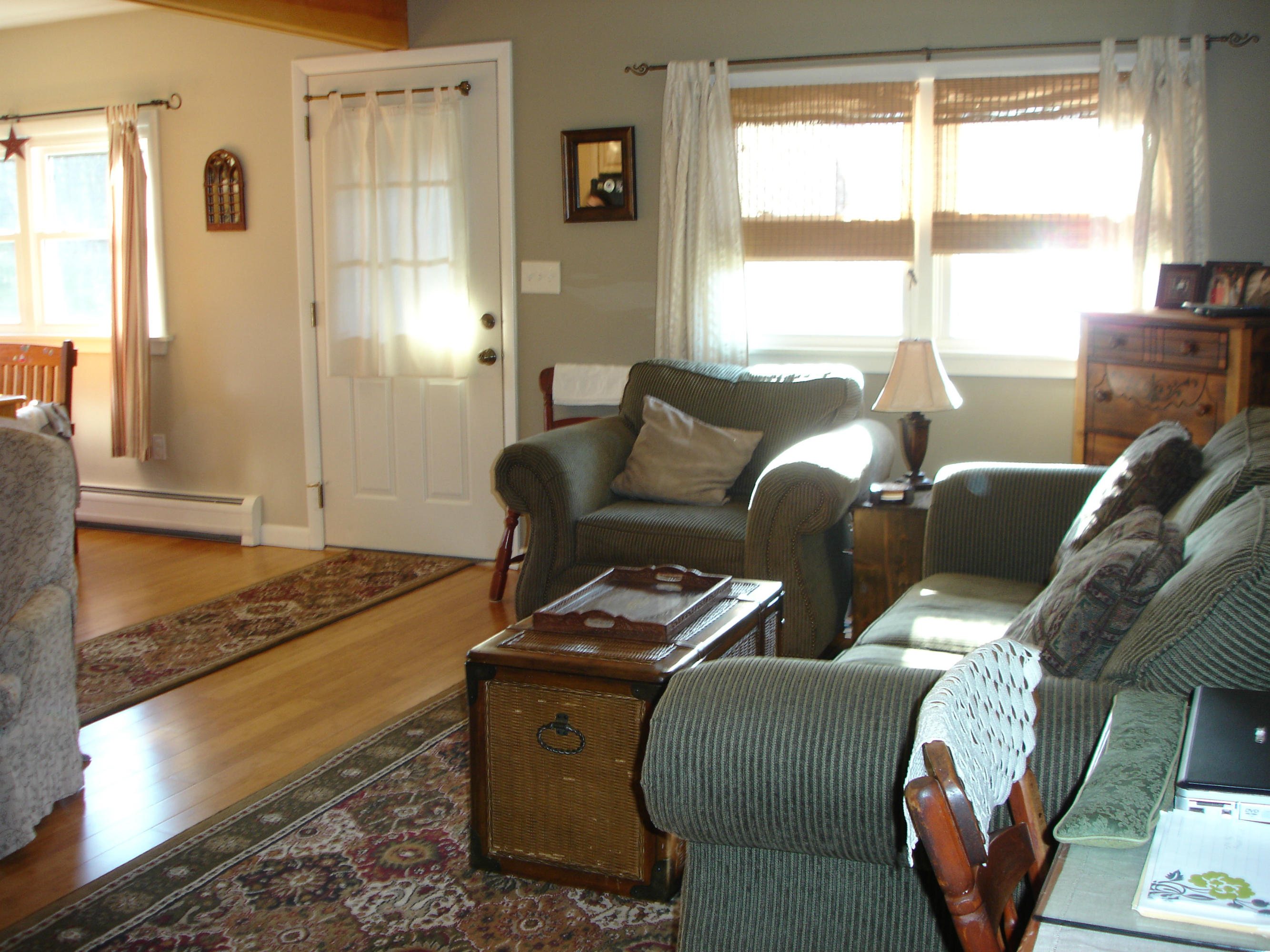 358 North Main Road Otis, MA 01253 - Photo 5 of 18 a living room with furniture and a window