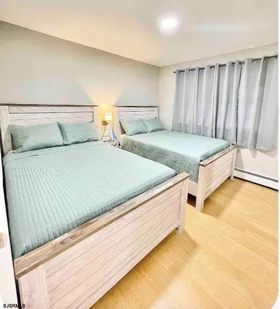 a bedroom with a bed and painted walls