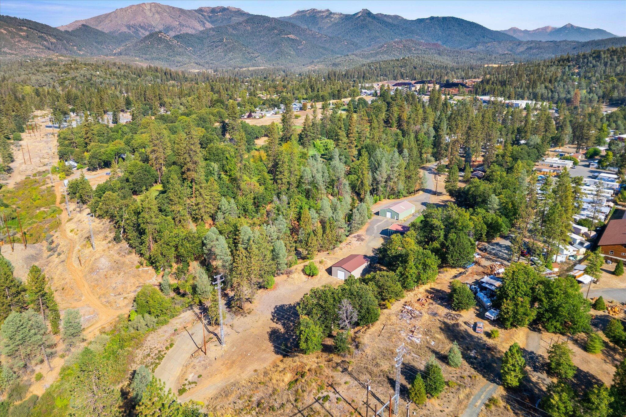 221 Davis Road Weaverville, CA 96093 - Photo 15 of 17 a view of a city with mountains in the background