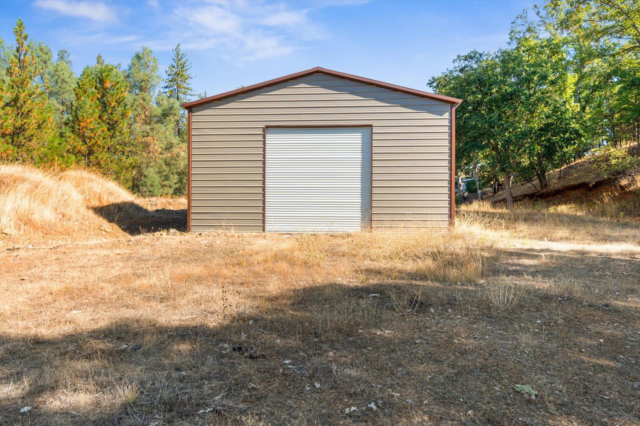 221 Davis Road Weaverville, CA 96093 - Photo 8 of 17 a view of a house with a yard