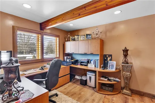 a room with furniture and a large window