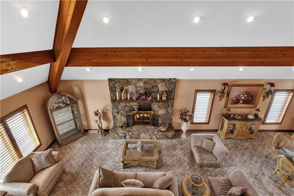 204 South Links Avenue Butler, PA 16001 - Photo 24 of 49 a living room with furniture and a floor to ceiling window