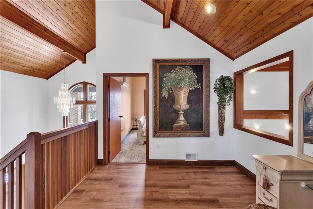 204 South Links Avenue Butler, PA 16001 - Photo 27 of 49 a view of a hallway with wooden floor and windows