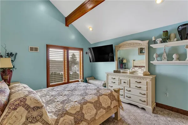 a room with furniture and a window