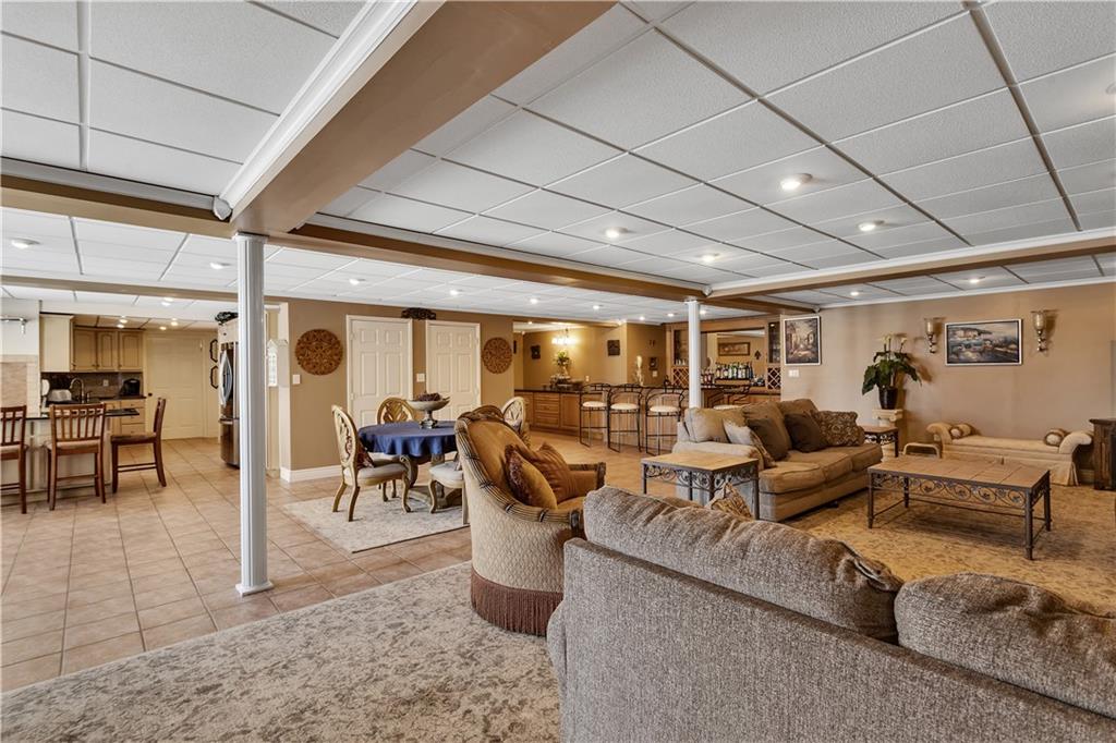 204 South Links Avenue Butler, PA 16001 - Photo 37 of 49 a living room with lots of furniture and a large window