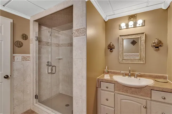a utility room with sink dryer and washer