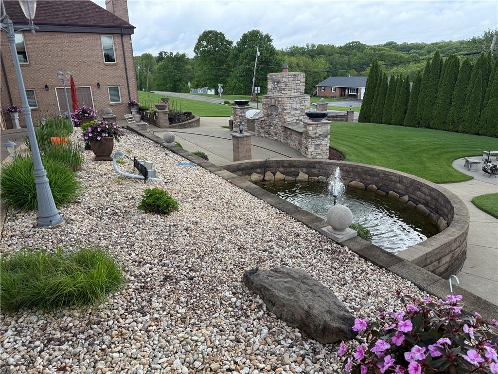 204 South Links Avenue Butler, PA 16001 - Photo 46 of 49 a view of a garden with patio