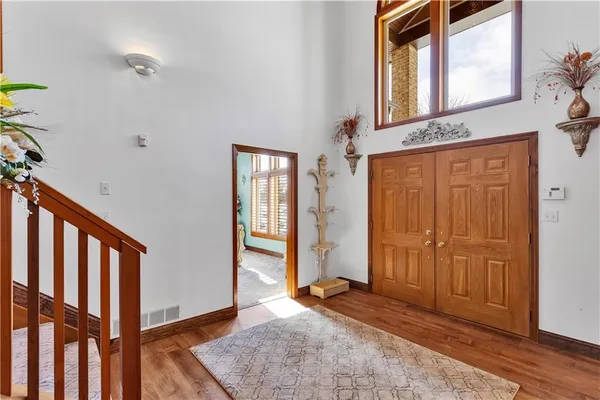 wooden floor and windows in an empty room