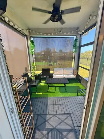 a living room with a couch and a table