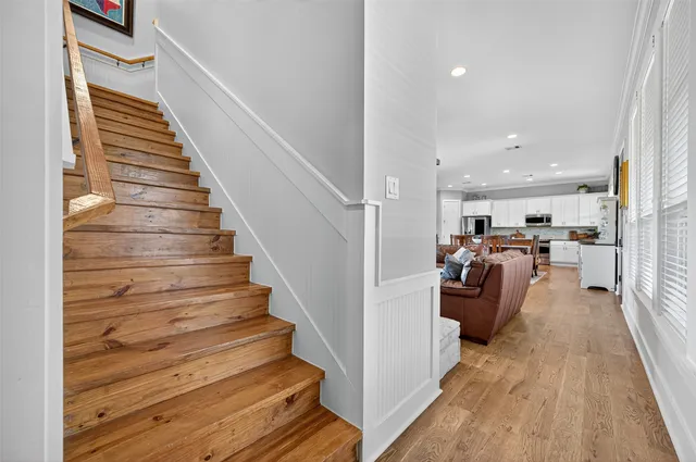 a view of a living room and entryway