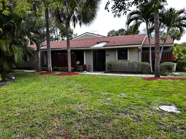 a view of a backyard with garden