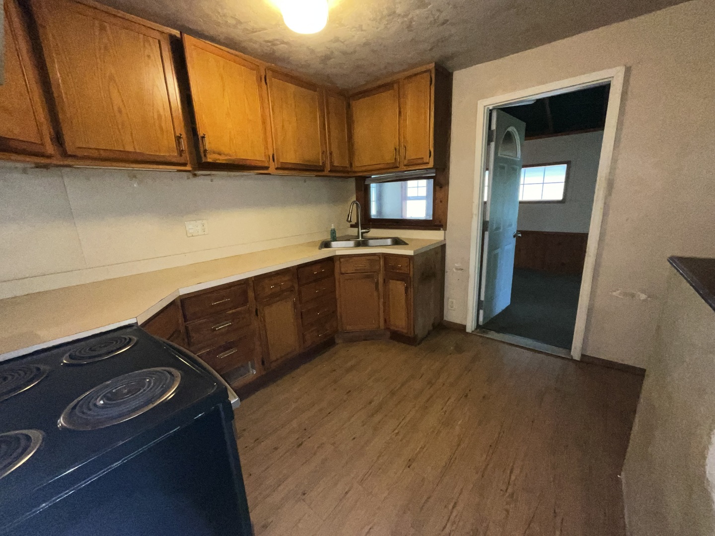 1422 River Road South Elgin, IL 60177 - Photo 11 of 31 a kitchen with a sink a stove and cabinets