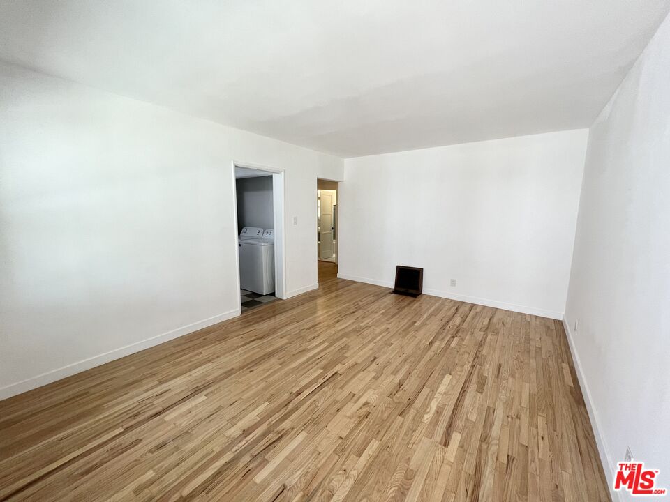 7962 Norton Avenue, Unit 2 West Hollywood, CA 90046 - Photo 3 of 12 a view of empty room with wooden floor