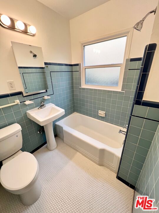 7962 Norton Avenue, Unit 2 West Hollywood, CA 90046 - Photo 9 of 12 a bathroom with a sink toilet and shower