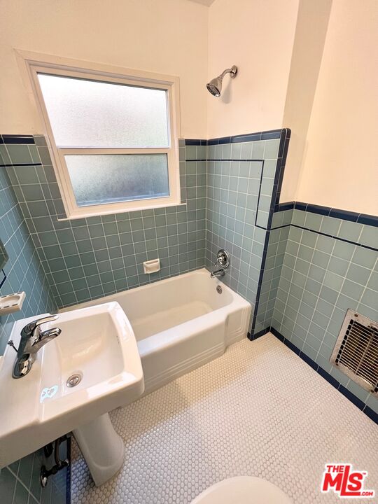 7962 Norton Avenue, Unit 2 West Hollywood, CA 90046 - Photo 10 of 12 a bathroom with a sink and mirror