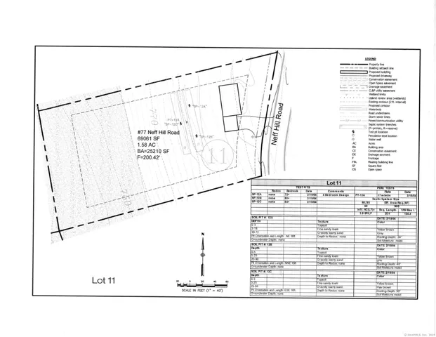 a picture of a bathroom with a window and a picture on the wall