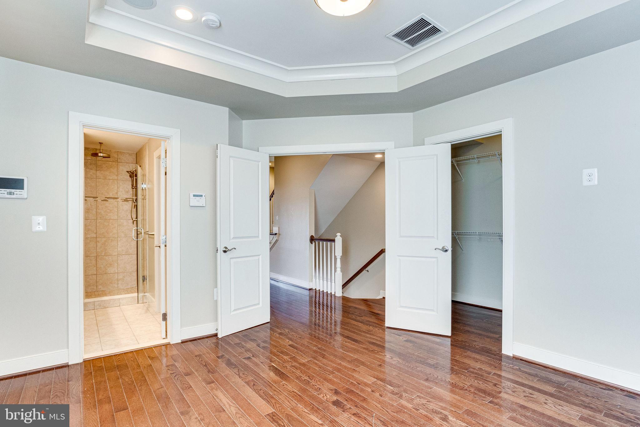 4529 Westhall Drive Washington, DC 20007 - Photo 17 of 36 wooden floor in an empty room
