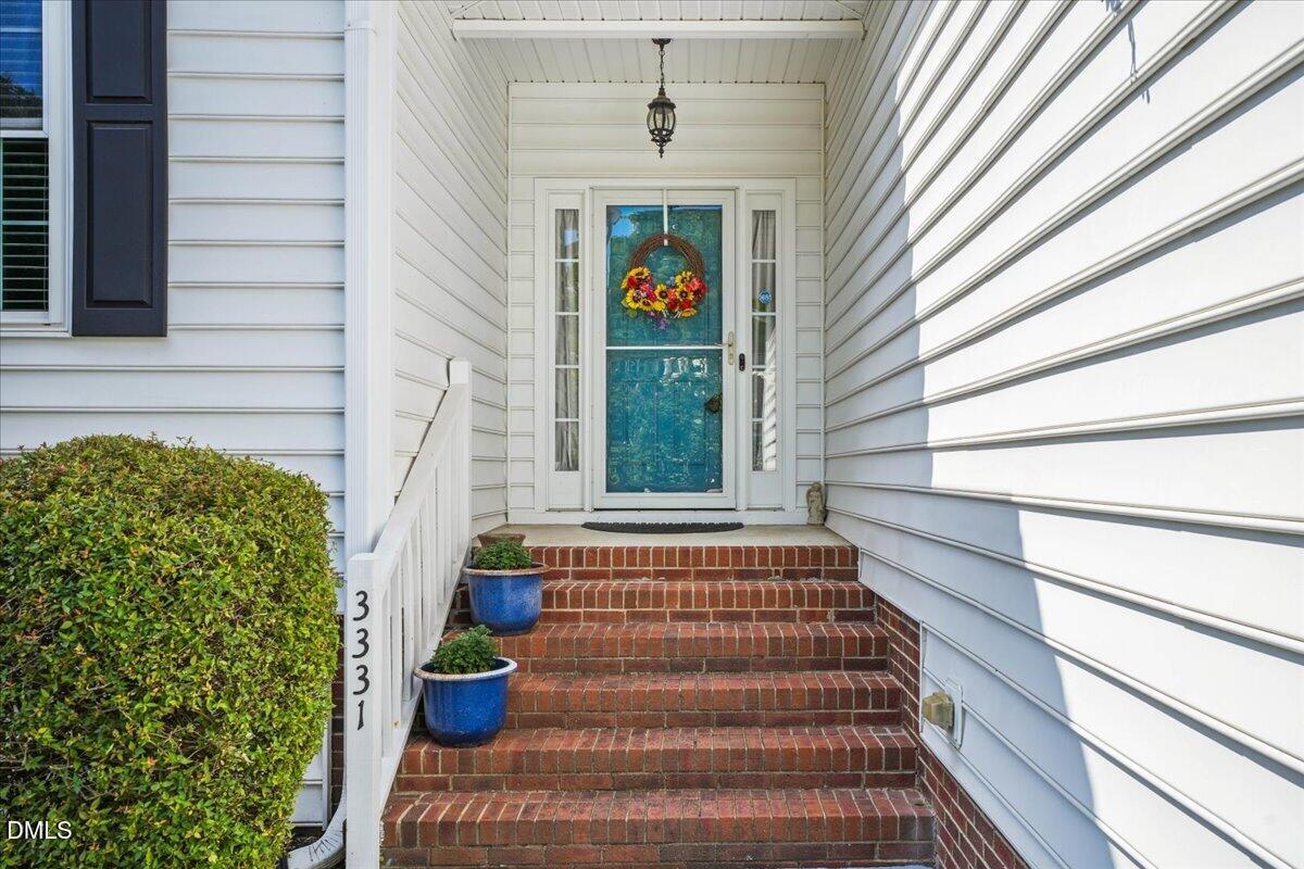 3331 Swinford Court Raleigh, NC 27604 - Photo 5 of 27 a view of entryway with a front door
