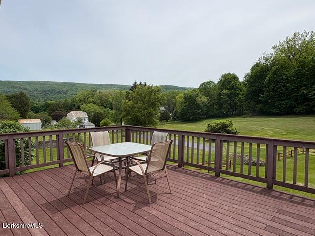 148 Friend Street Adams, MA 01220 - Photo 2 of 28 a view of a deck with wooden floor and seating space