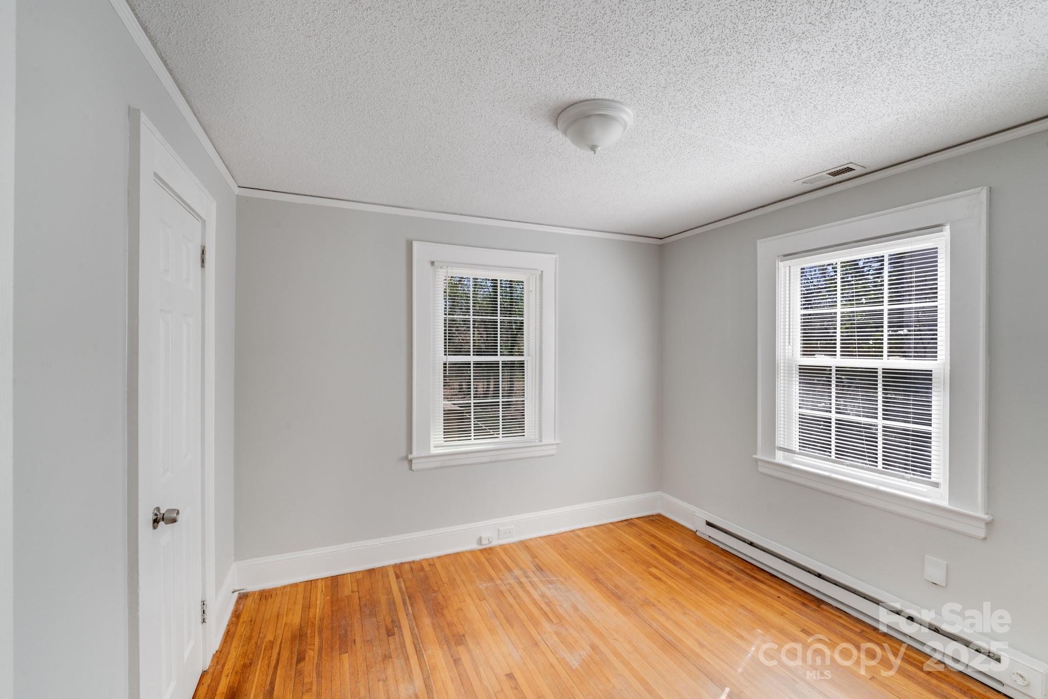 3138 Morson Street Charlotte, NC 28208 - Photo 12 of 21 an empty room with a window