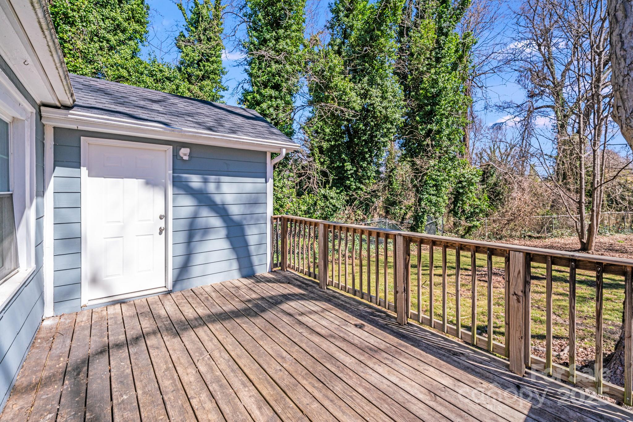 3138 Morson Street Charlotte, NC 28208 - Photo 18 of 21 a view of balcony with wooden floor