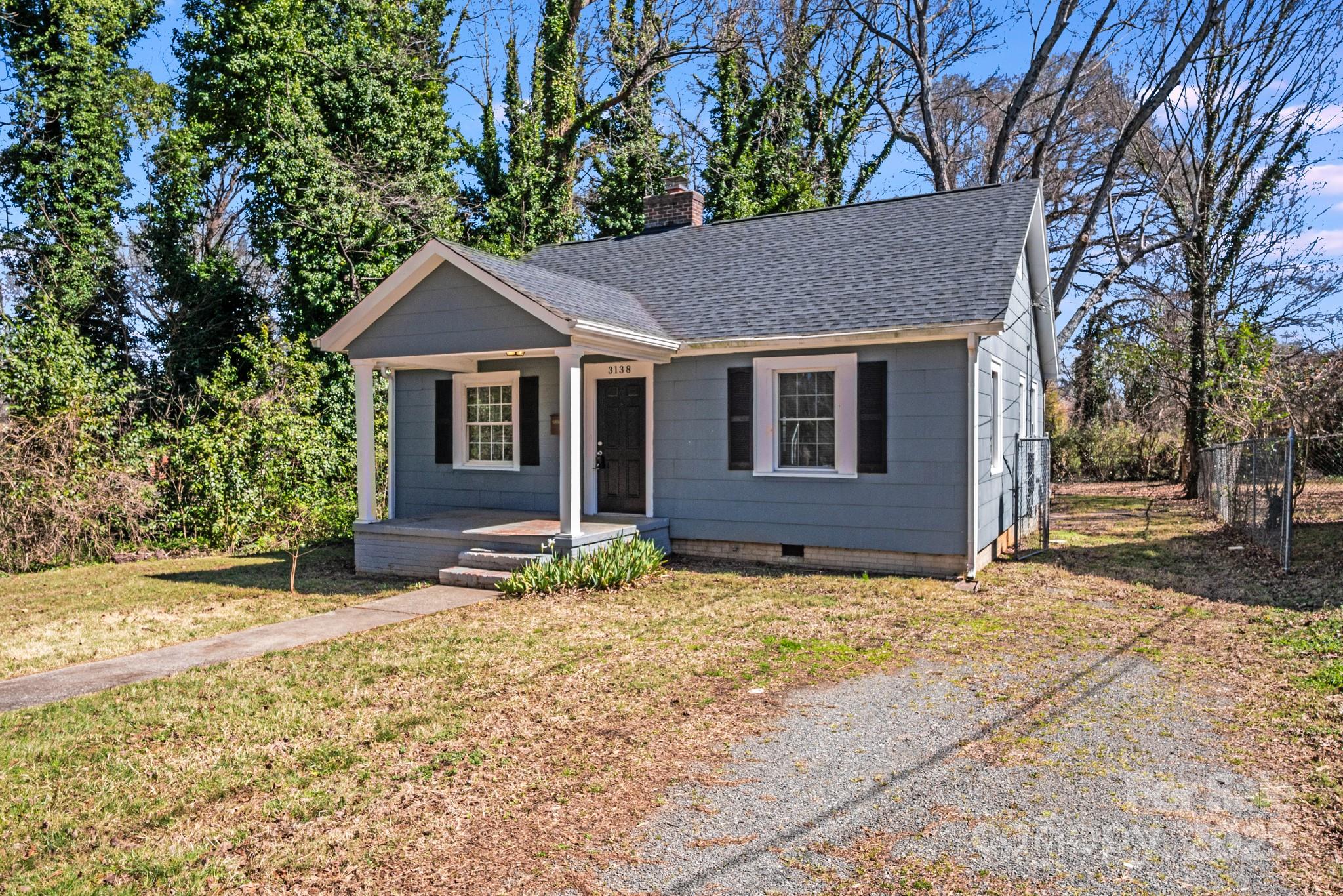 3138 Morson Street Charlotte, NC 28208 - Photo 21 of 21 a front view of a house with a yard