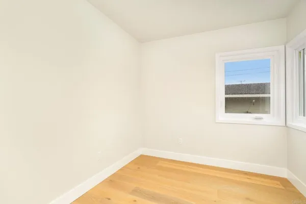 a view of a small space with a wooden floor