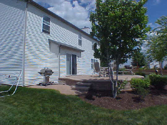 2501 Ridgefield Drive Belvidere, IL 61008 - Photo 5 of 6 a house view with a garden space