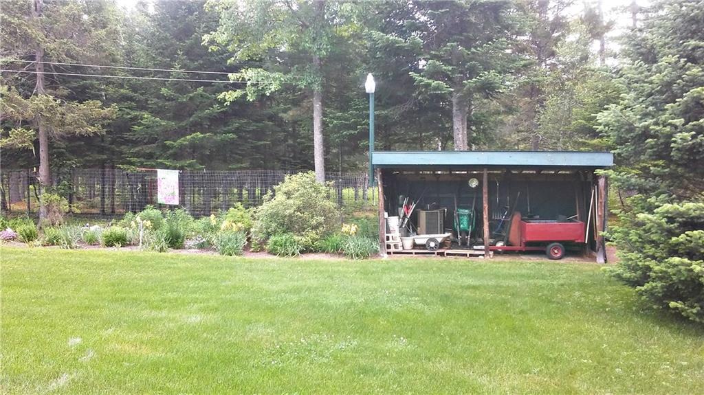50 Birch Road New Portland, ME 04961 - Photo 8 of 32 Backyard with Storage Shed