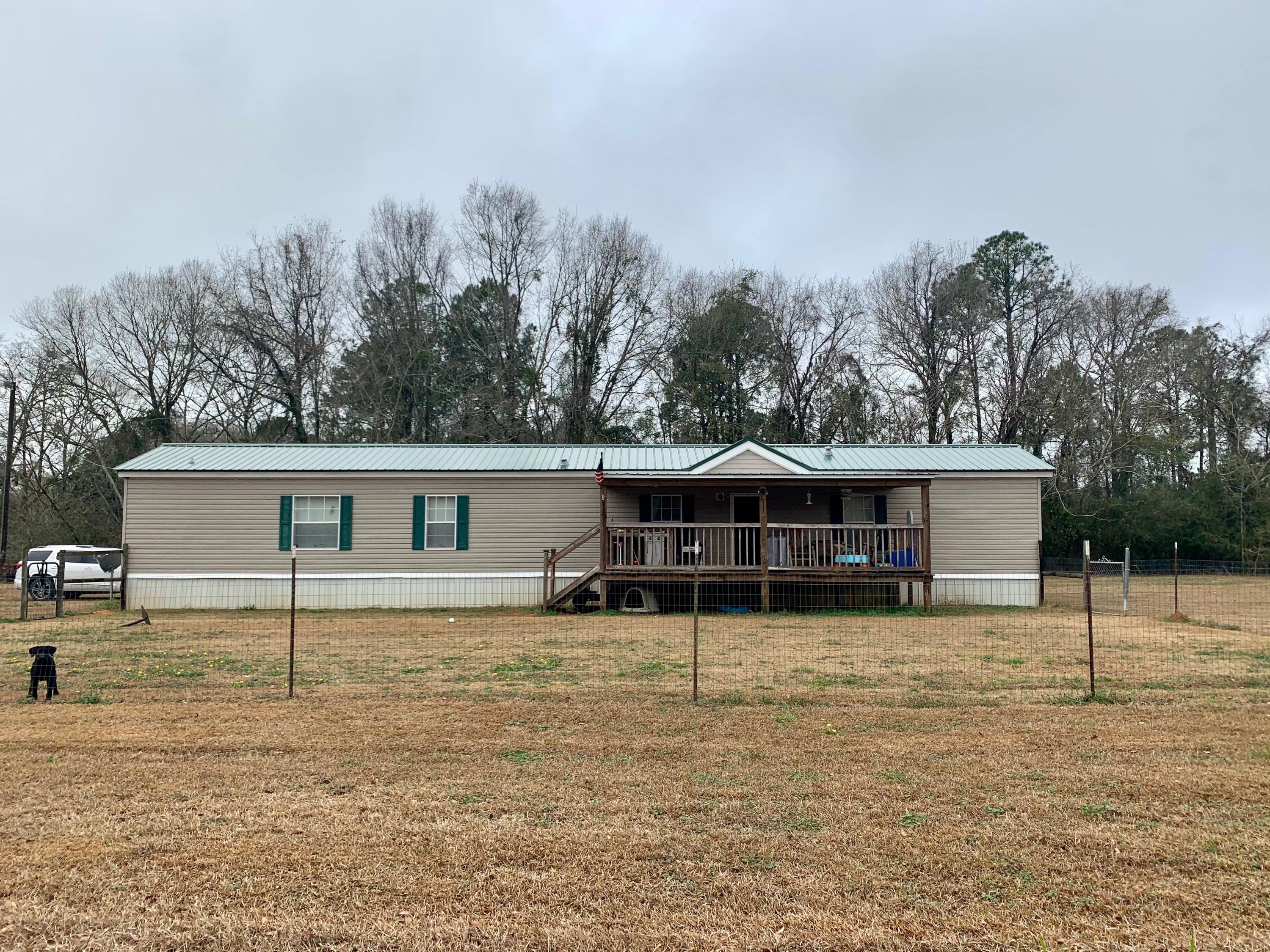 5478 Elzie Road Baker, FL 32531 - Photo 1 of 1 front view of a house with a yard