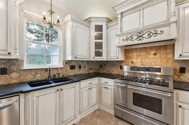 a view of an empty room with empty shelves