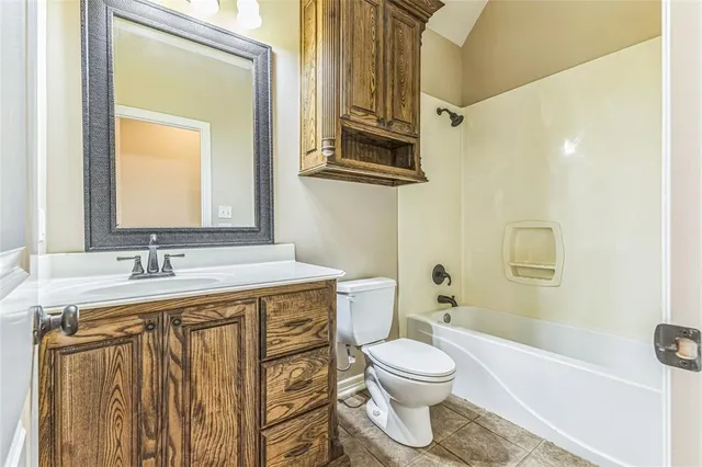 a view of a livingroom with a ceiling fan and window