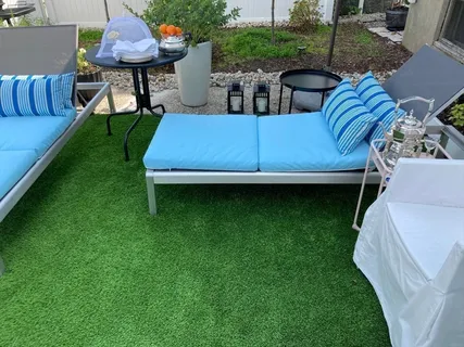 a view of yard with outdoor seating and green space