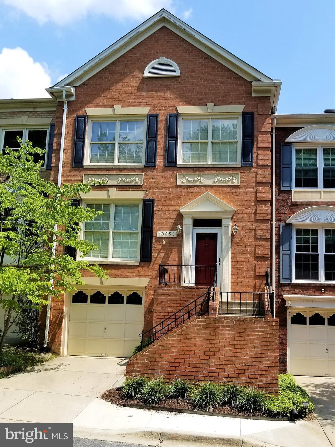 10955 Rocky Mt Way Silver Spring, MD 20902 - Photo 1 of 30 a front view of a house with garden