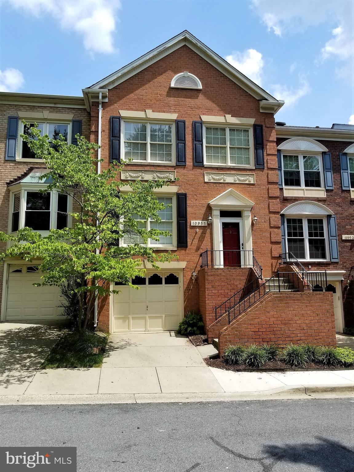 10955 Rocky Mt Way Silver Spring, MD 20902 - Photo 2 of 30 a front view of a house with a yard
